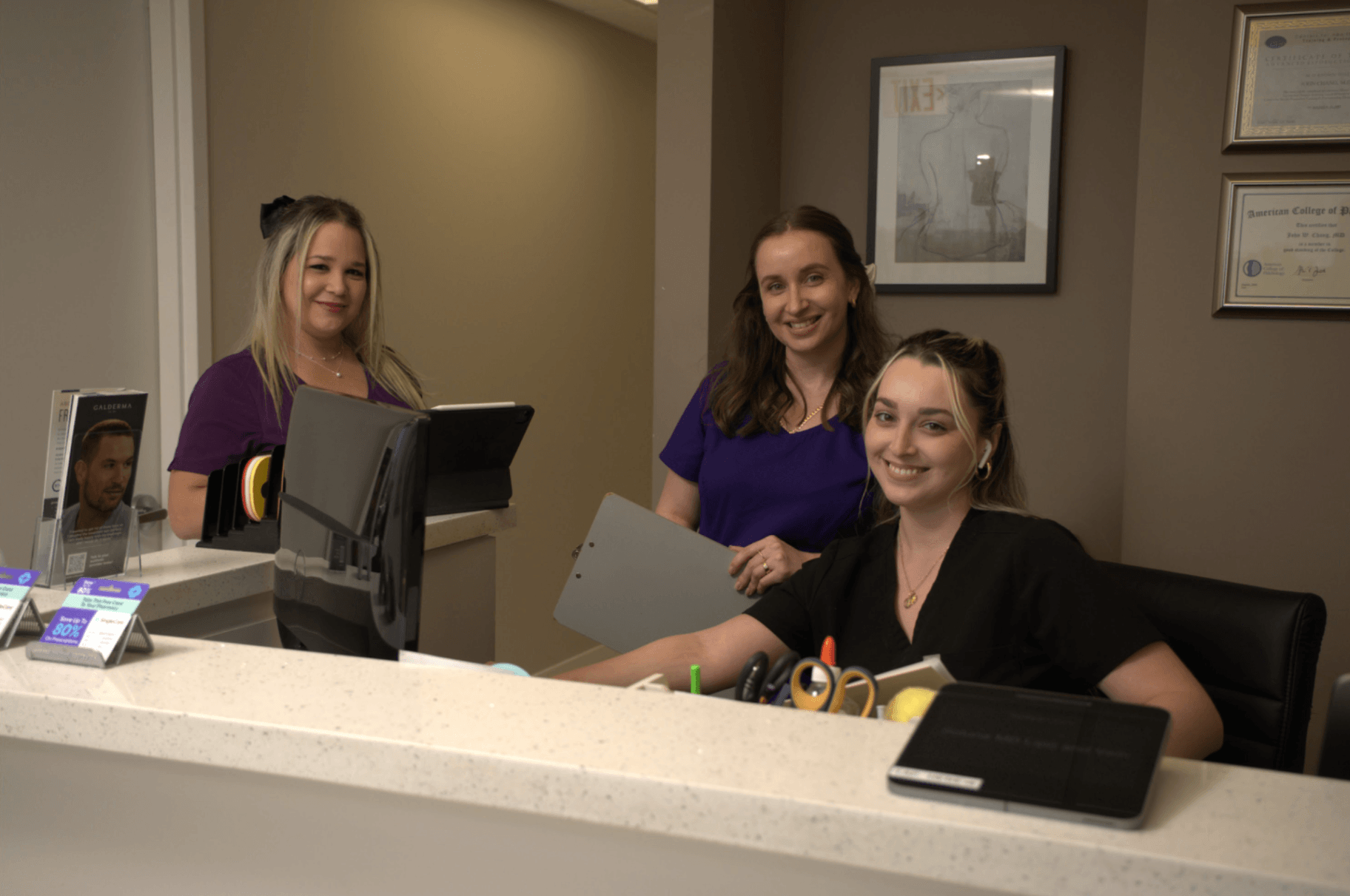 Miami Vein Institute front desk team welcoming patients at reception