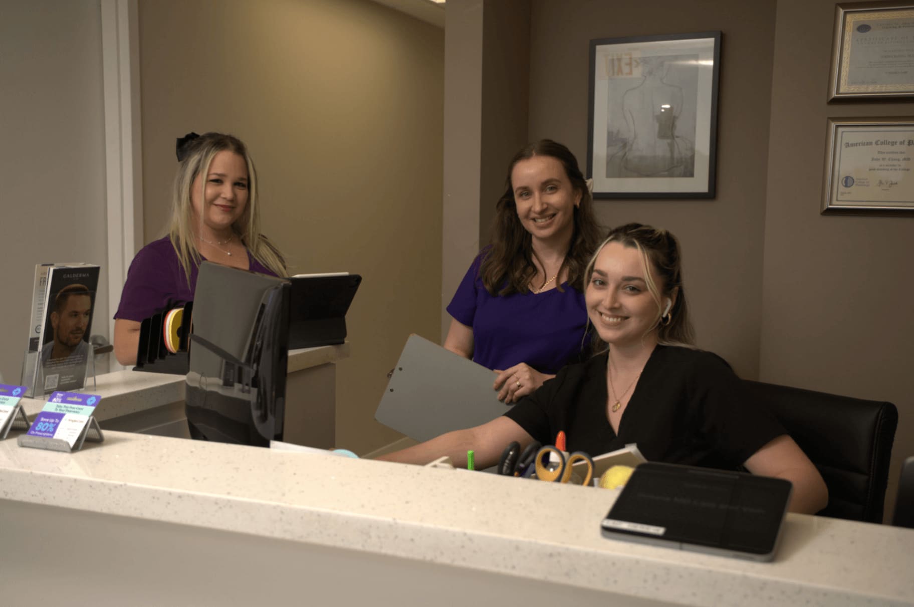 Miami Vein Institute front desk team welcoming patients at reception